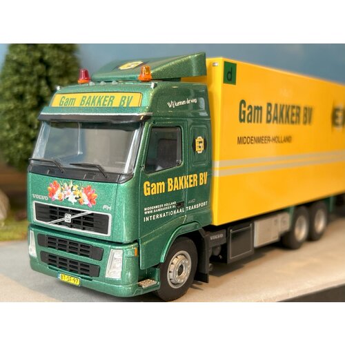 Tekno Tekno Volvo FH12 Globetrotter  truck with with 2-axle trailer GAM BAKKER