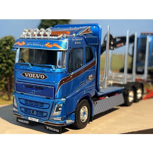 Tekno Tekno Volvo FH04 rigid truck with trailer / wood-combi JAN JOHANSSON