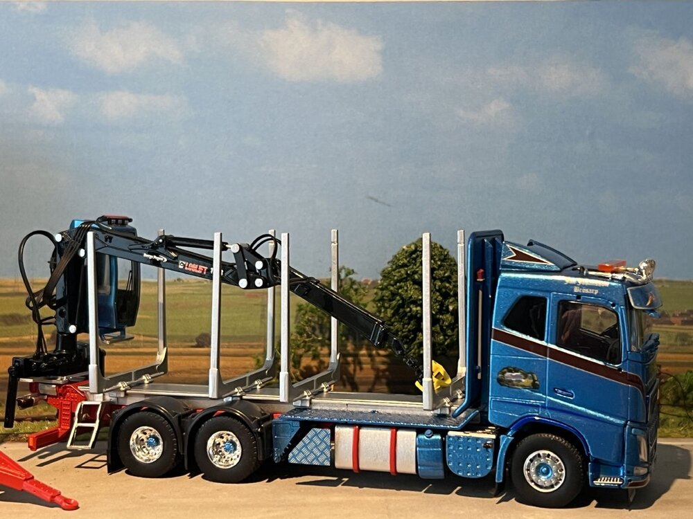 Tekno Volvo FH04 motorwagen aanhanger met houtopbouw JAN JOHANSSON