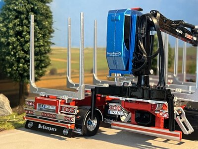 Tekno Volvo FH04 motorwagen aanhanger met houtopbouw JAN JOHANSSON