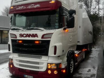 Tekno Tekno Scania R-serie Topline met 2-assige koeloplegger FRAU HEINRICHS