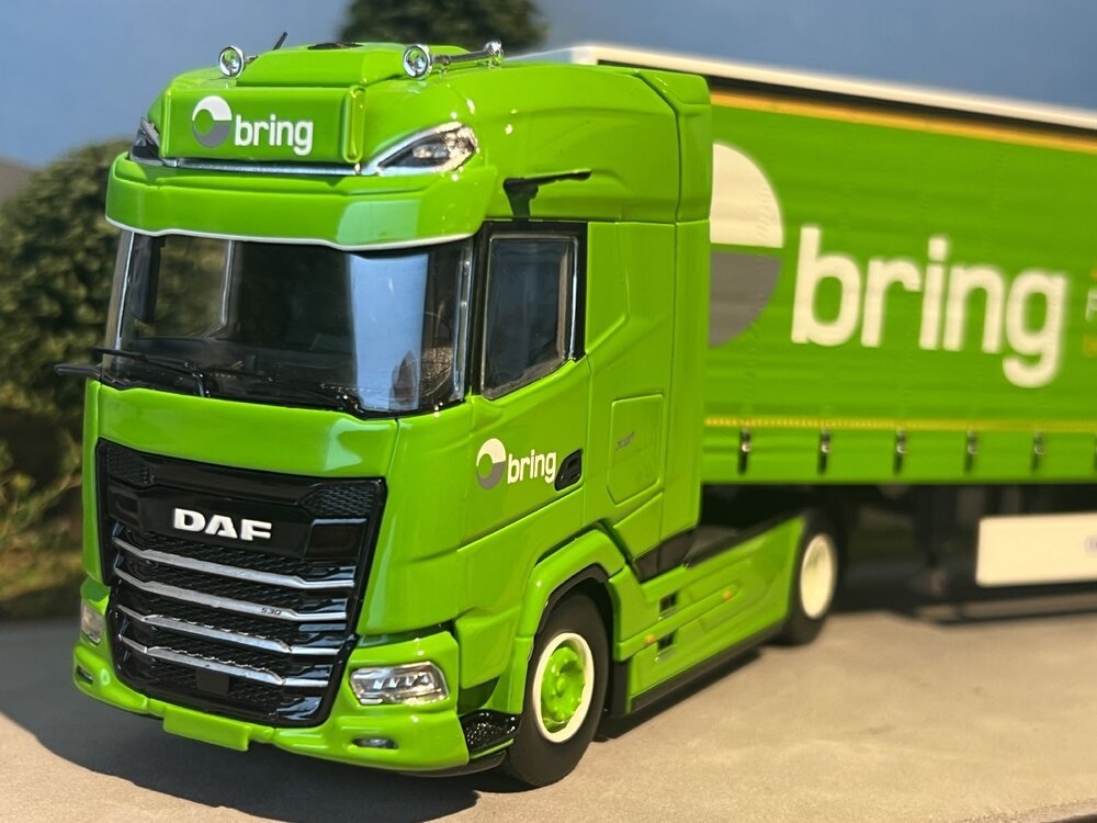 Tekno Tekno DAF XG+ with 3-axle curtainside trailer BRING