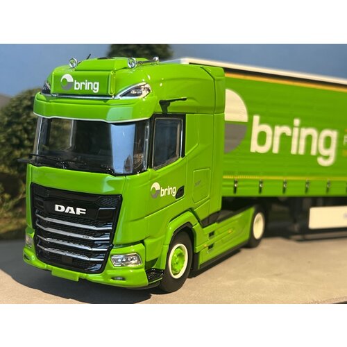 Tekno Tekno DAF XG+ with 3-axle curtainside trailer BRING