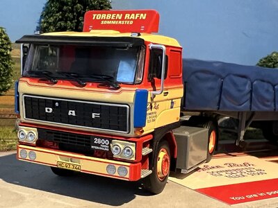 Tekno Tekno DAF 2800 with 3-axle classic flatbed trailer + covered load Torben Rafn