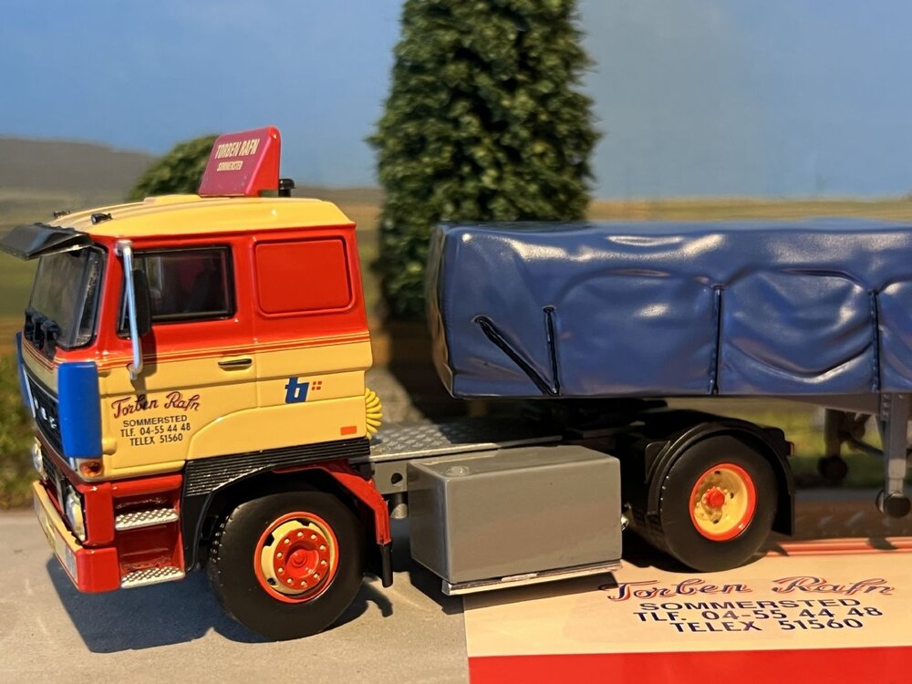 Tekno Tekno DAF 2800 with 3-axle classic flatbed trailer + covered load Torben Rafn