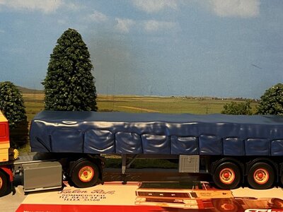 Tekno Tekno DAF 2800 with 3-axle classic flatbed trailer + covered load Torben Rafn