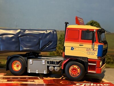 Tekno Tekno DAF 2800 with 3-axle classic flatbed trailer + covered load Torben Rafn