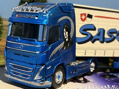 Tekno Tekno Volvo FH05 Globetrotter XL 4x2 met -as schuifzeilentrailer SASCHA BERTHOLD