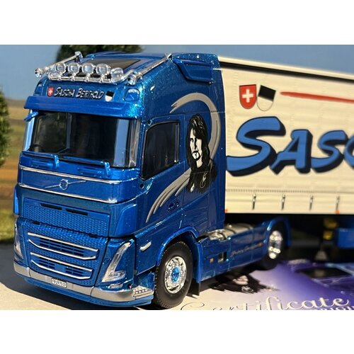 Tekno Tekno Volvo FH05 Globetrotter XL 4x2 met -as schuifzeilentrailer SASCHA BERTHOLD