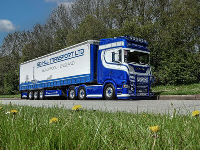 Tekno Tekno Scania Next Gen S-serie Highline met 3-assige schuifzeilenoplegger SID HILL