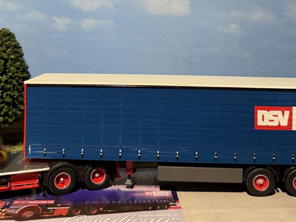 Tekno Tekno Scania 143 6x2 with 3-axle curtainside trailer KNUD NIELSEN