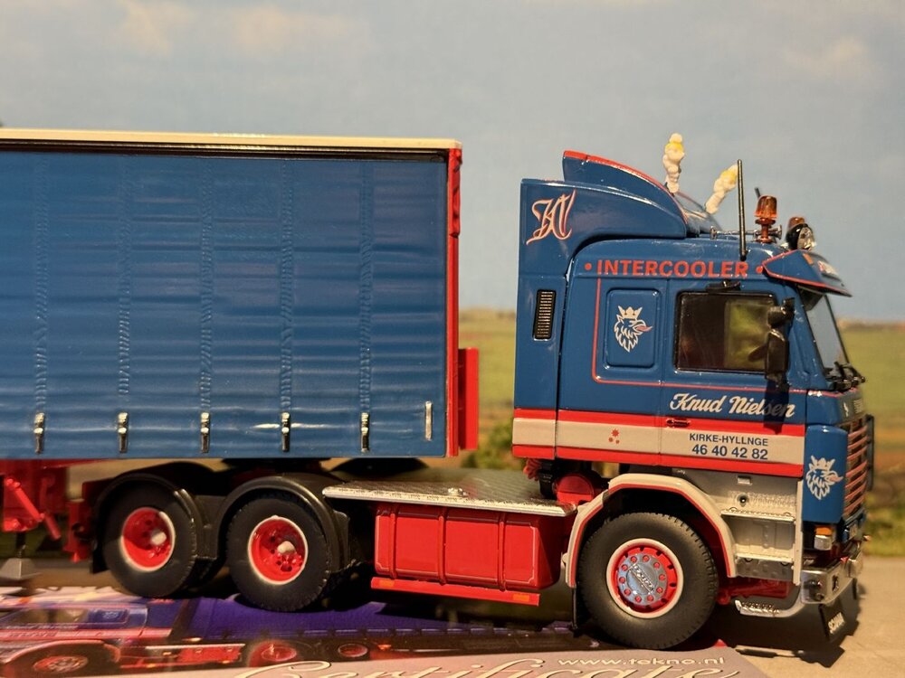Tekno Tekno Scania 143 6x2 with 3-axle curtainside trailer KNUD NIELSEN