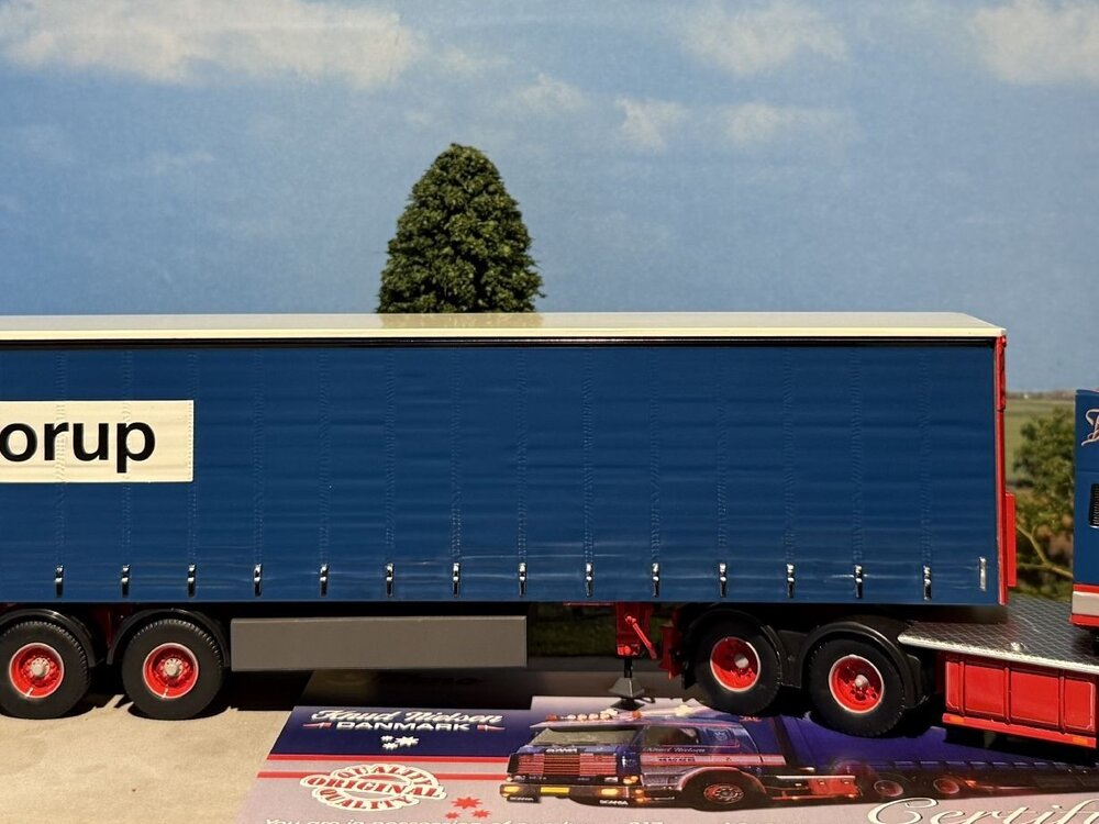 Tekno Tekno Scania 143 6x2 with 3-axle curtainside trailer KNUD NIELSEN