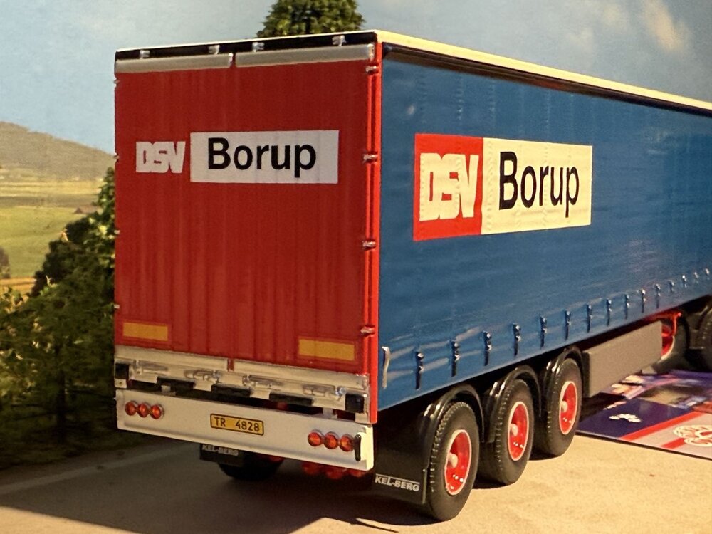 Tekno Tekno Scania 143 6x2 with 3-axle curtainside trailer KNUD NIELSEN