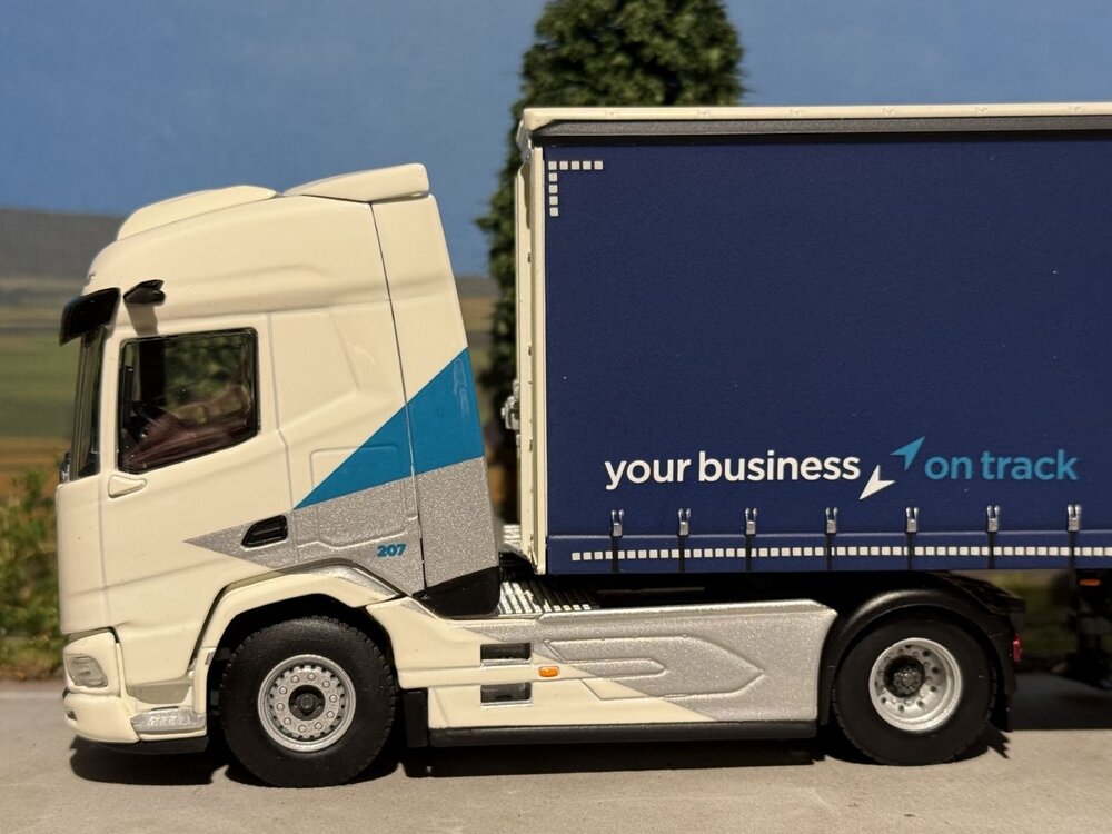 WSI WSI DAF XF SH 4x2 met 3-as schuifzeilen oplegger WILLEMS LOGISTICS
