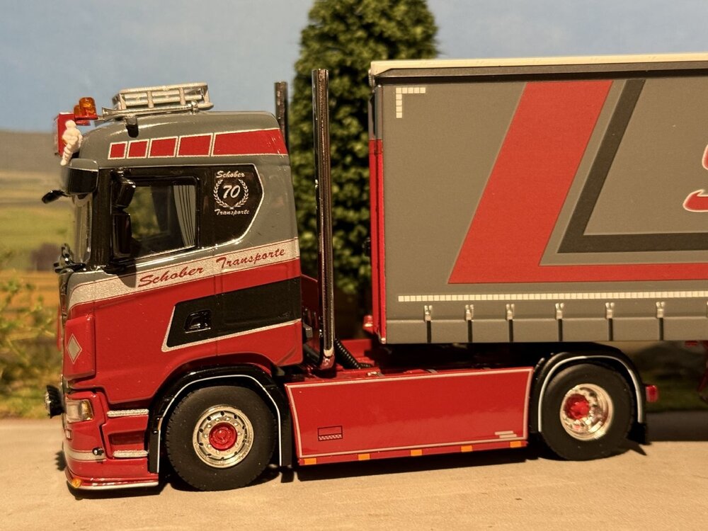 WSI WSI Scania S Normal 4x2 with 3-axle curtainside trailer SCHOBER