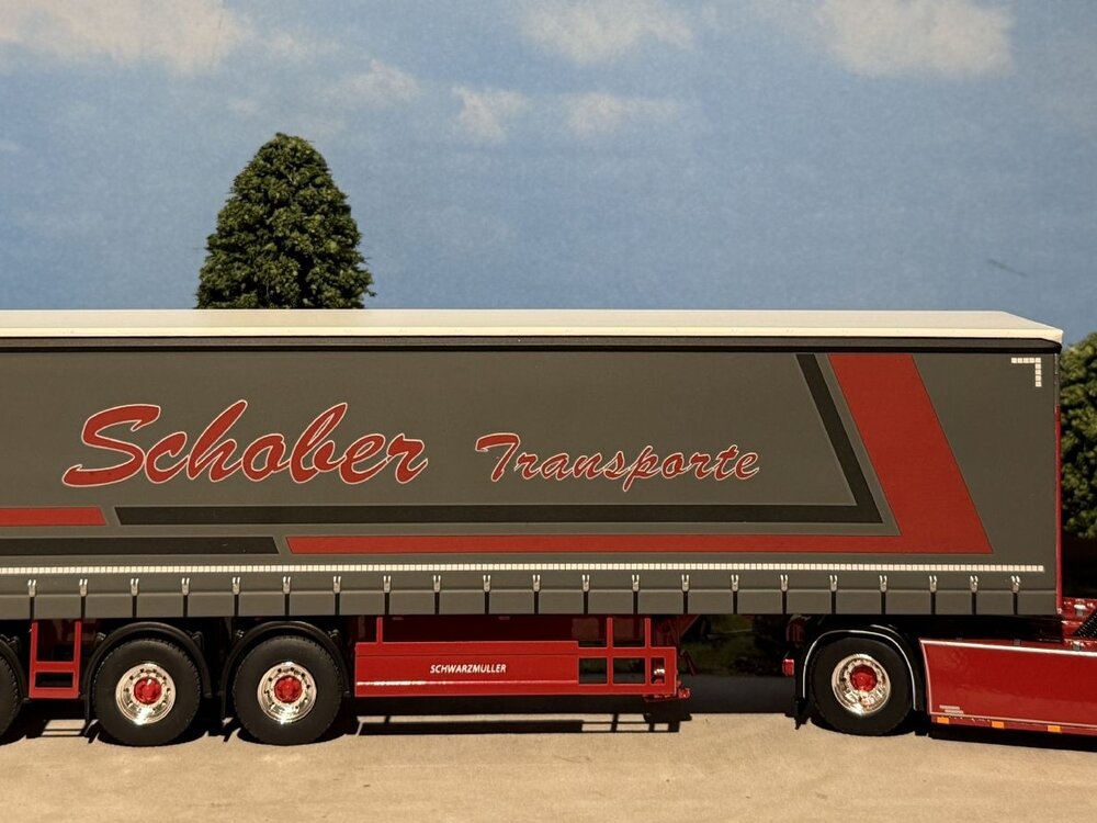 WSI WSI Scania S Normal 4x2 with 3-axle curtainside trailer SCHOBER