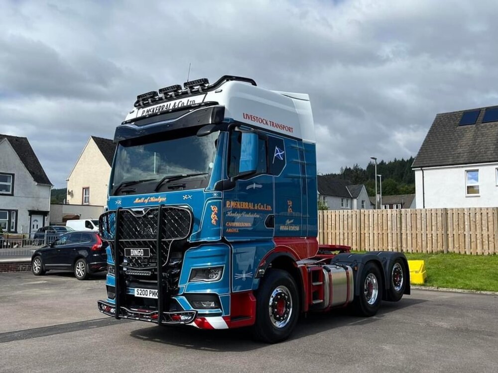 Tekno Tekno MAN GM 6x2 with 3-axle flatbed trailer MCKERRAL
