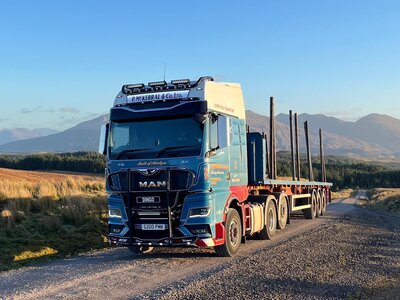 Tekno Tekno MAN GM 6x2 with 3-axle flatbed trailer MCKERRAL