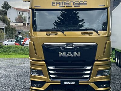 Tekno Tekno MAN TGX GX 4x2 with 3-axle reefer trailer MULLER -  Golden Commander