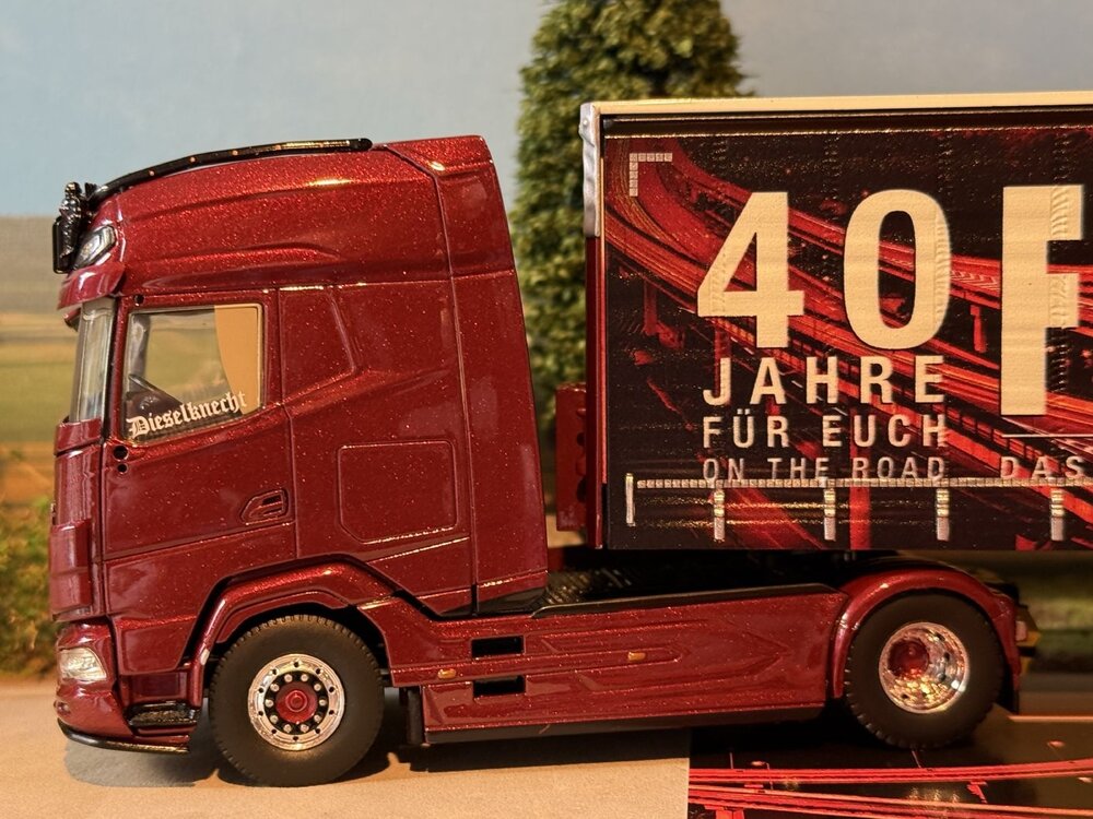 Tekno Tekno Daf XG+ with 3-axle curtainside trailer FERNFAHRER 40 JAHRE
