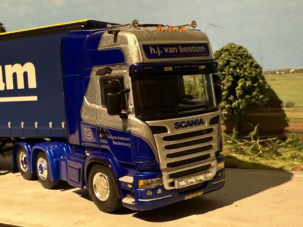 WSI  WSI Scania R Topline 6x2 with 3-axle curtainside trailer H.J. VAN BENTUM