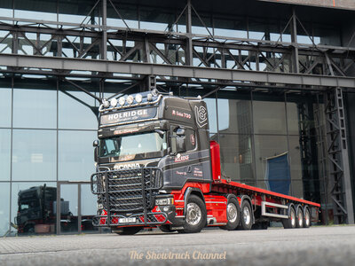 Tekno Tekno Scania R-serie Topline 6x2 met 3-assige vlakke trailer HOLRIDGE