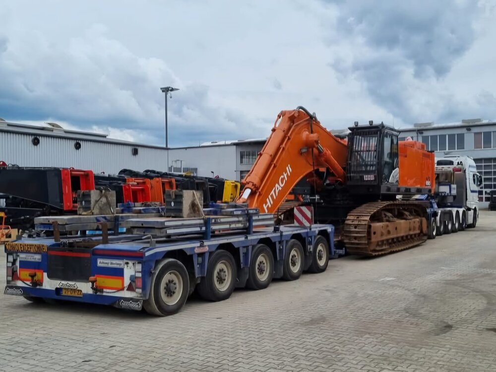 WSI WSI "EXCLUSIEF" MAN TGX XXL EURO 6C Facelift 10x4 met 5-as dieplader + 2-as dolly TWAN BIERINGS
