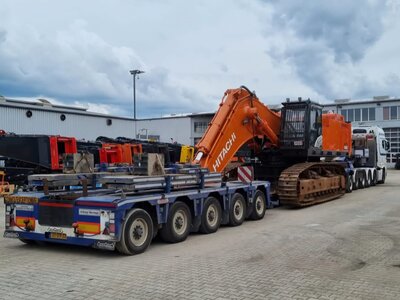 WSI WSI "EXCLUSIEF" MAN TGX XXL EURO 6C Facelift 10x4 met 5-as dieplader + 2-as dolly TWAN BIERINGS