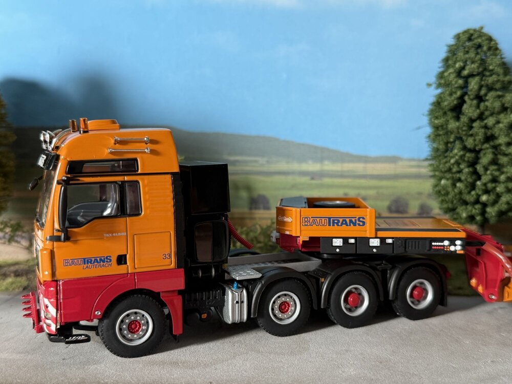 WSI WSI MAN TGX XXL 8x4 met euro lowloader + interdolly BAUTRANS