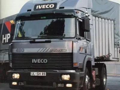 Tekno Tekno Iveco Turbostar Demo 480PK with 3-axle curtainside trailer