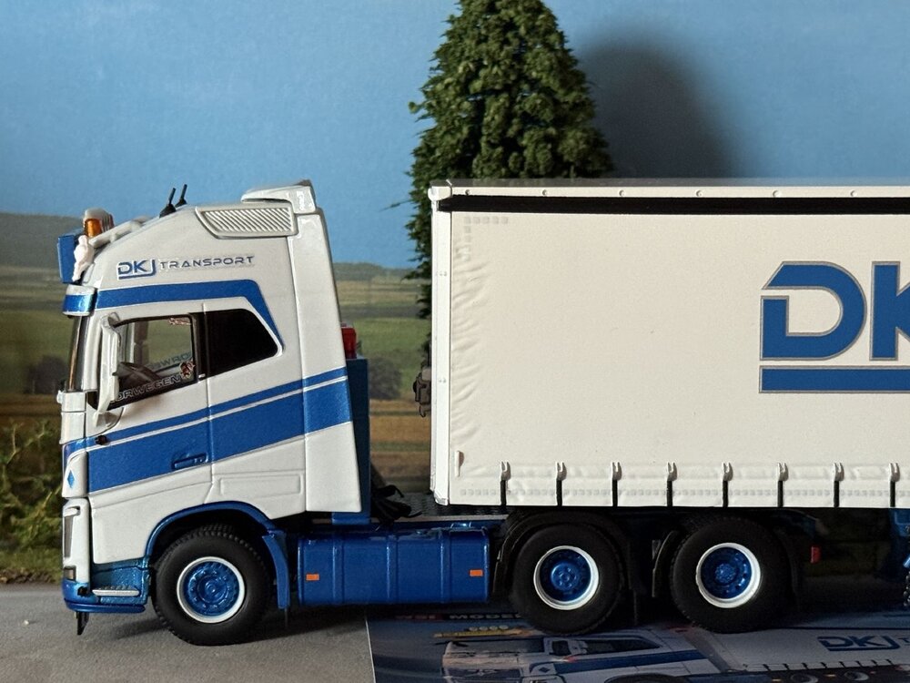 WSI WSI Volvo FH4 Glob. XL 6x2 with 3-axle semi with curtainside trailer DKJ TRANSPORT