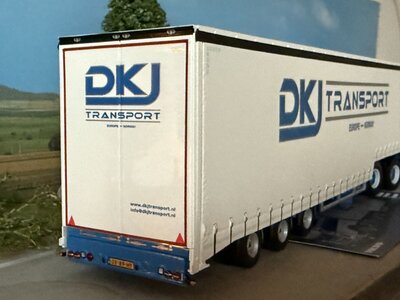 WSI WSI Volvo FH4 Glob. XL 6x2 with 3-axle semi with curtainside trailer DKJ TRANSPORT
