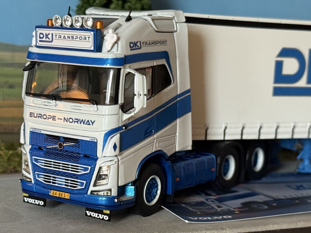 WSI WSI Volvo FH4 Glob. XL 6x2 with 3-axle semi with curtainside trailer DKJ TRANSPORT
