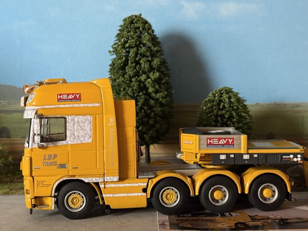 WSI WSI DAF 105XF Super Space Cab 8x4 + 4-axle Nooteboom euro lowloader L&P TRANS
