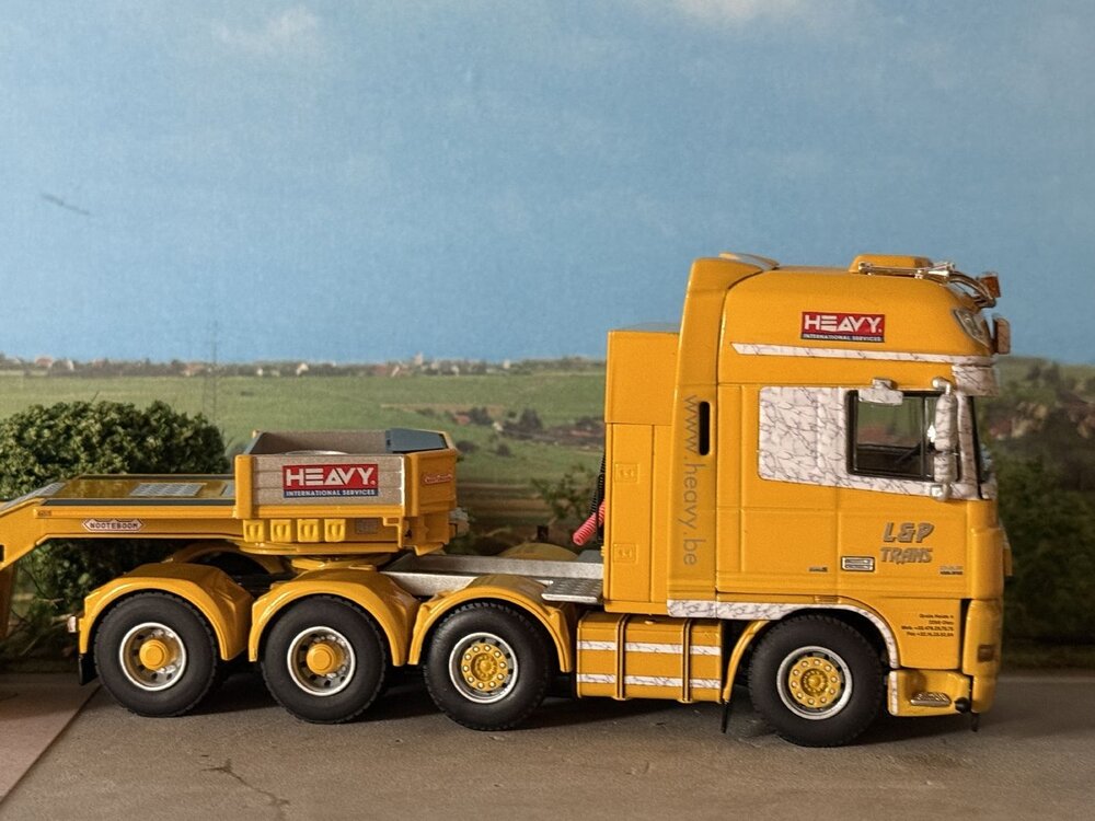 WSI WSI DAF 105XF Super Space Cab 8x4 + 4-axle Nooteboom euro lowloader L&P TRANS