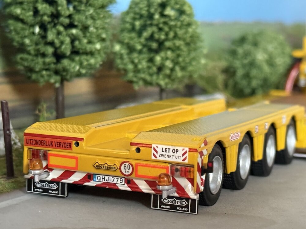 WSI WSI DAF 105XF Super Space Cab 8x4 + 4-axle Nooteboom euro lowloader L&P TRANS