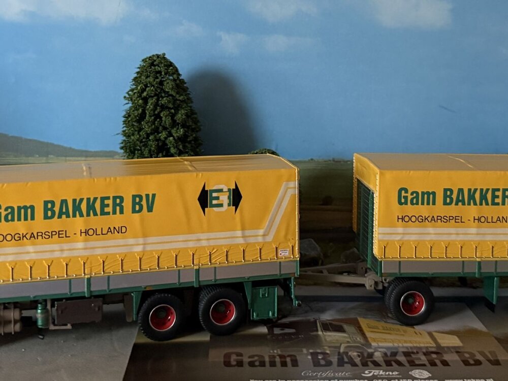 Tekno Tekno Volvo F12 6x2 motorwagen met 2-assige huifaanhanger GAM BAKKER