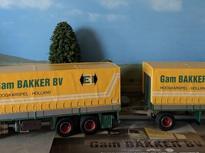 Tekno Tekno Volvo F12 6x2 motorwagen met 2-assige huifaanhanger GAM BAKKER