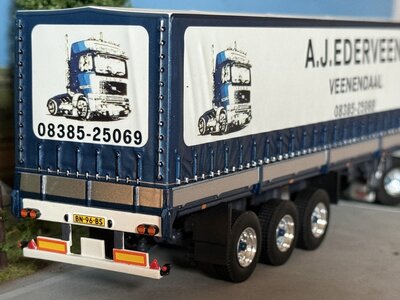 Tekno Tekno Volvo F12 Globetrotter 4x2 met 3-as klassieke huifoplegger EDERVEEN