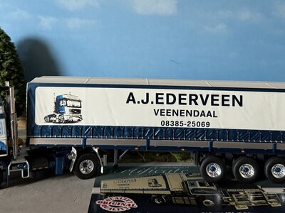 Tekno Tekno Volvo F12 Globetrotter 4x2 met 3-as klassieke huifoplegger EDERVEEN