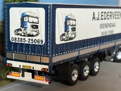 Tekno Tekno Volvo F12 Globetrotter 4x2 met 3-as klassieke huifoplegger EDERVEEN
