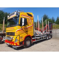 Tekno Volvo FH05 Globetrotter motorwagen met 3-assige hout-wipkar COILLE