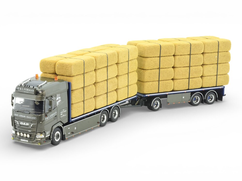 Tekno Tekno DAF XF riged truck with flatbed trailer loaded with straw P&L FORMAN