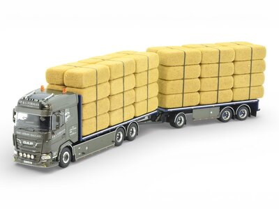 Tekno Tekno DAF XF riged truck with flatbed trailer loaded with straw P&L FORMAN