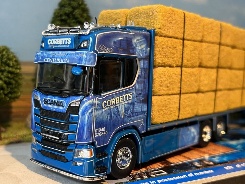 Tekno Tekno Scania Next Gen S650 Highline vlakke motorwagen met 3-assige wipkar (incl. lading) CORBETTS