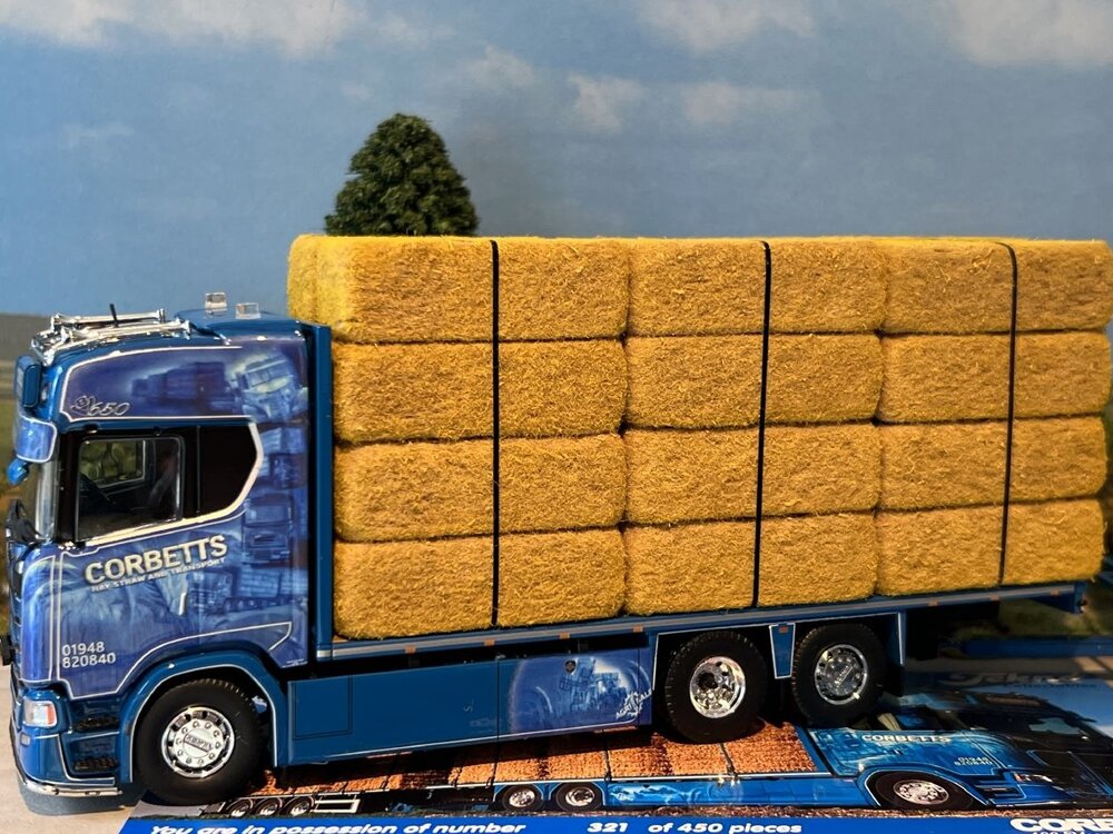 Tekno Tekno Scania Next Gen S650 Highline vlakke motorwagen met 3-assige wipkar (incl. lading) CORBETTS