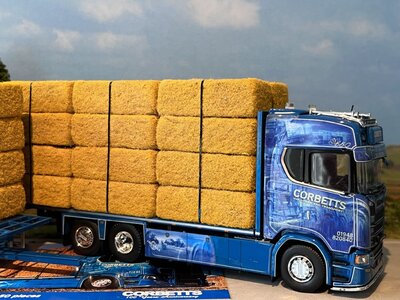 Tekno Tekno Scania Next Gen S650 Highline rigid truck with 3-axle flatbed trailer (incl. load) CORBETTS