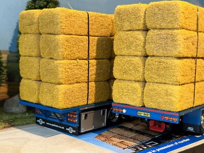 Tekno Tekno Scania Next Gen S650 Highline rigid truck with 3-axle flatbed trailer (incl. load) CORBETTS