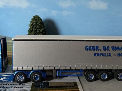 WSI WSI MAN TGX XXL 6X2 with 3-axle curtainside trailer MAURICE DE WAARD